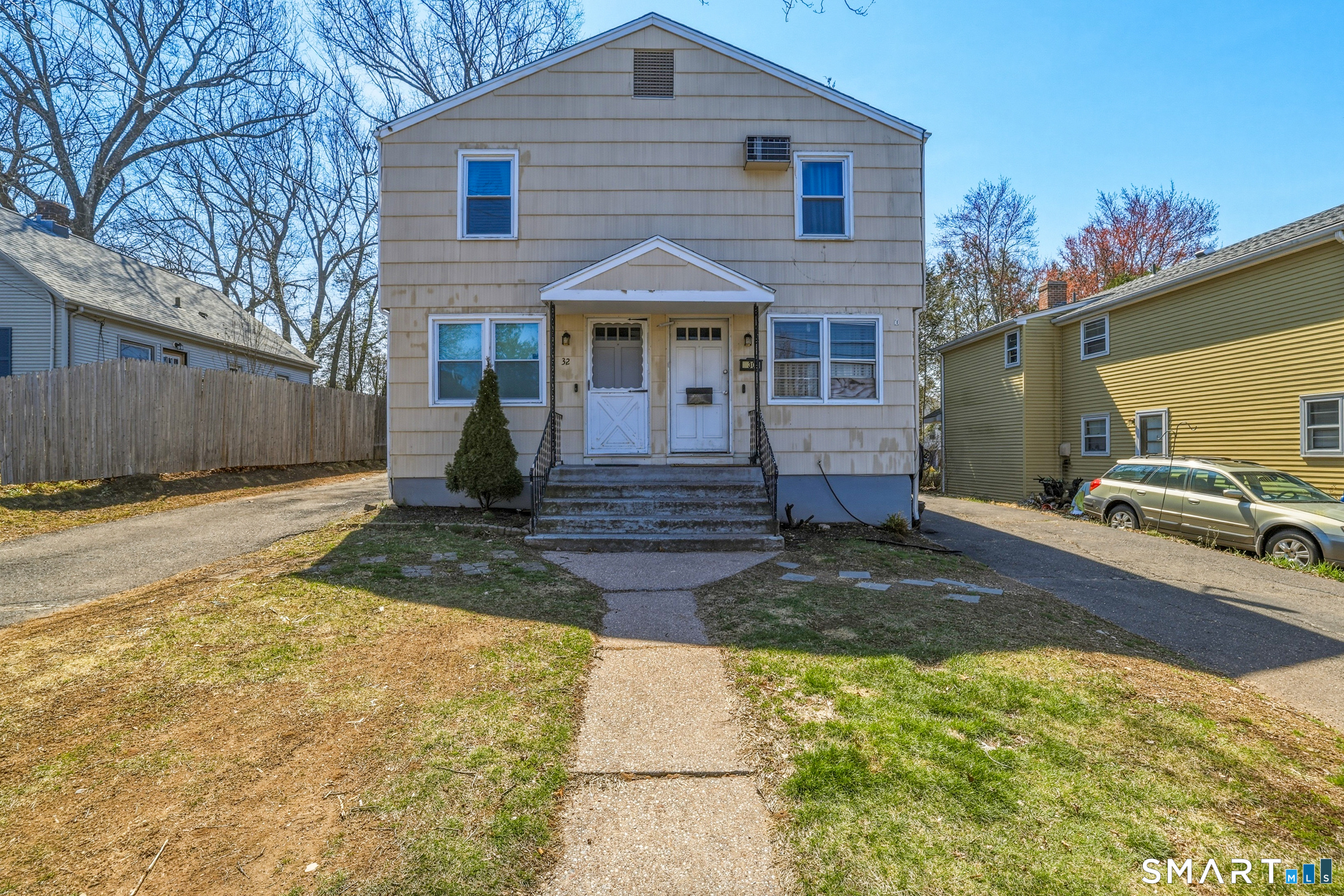 30 Lyndale Street Manchester, CT 06040 - Photo 1 of 37 a front view of a house with a yard