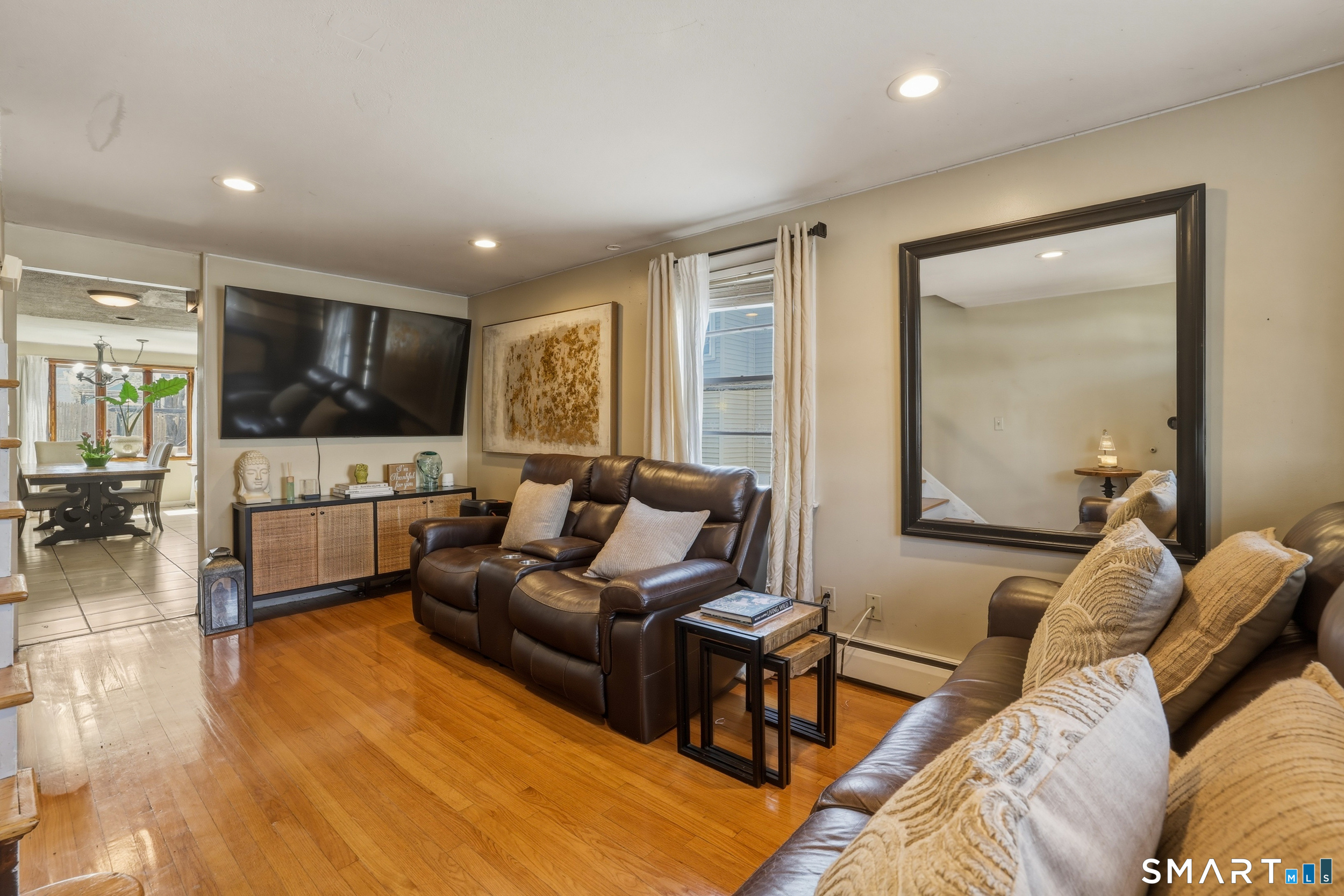 30 Lyndale Street Manchester, CT 06040 - Photo 17 of 37 a living room with furniture and a flat screen tv