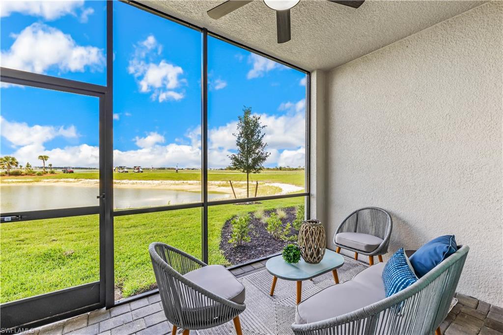 43060 Greenway Boulevard, Unit 715 Babcock Ranch, FL 33982 - Photo 1 of 14 a view of a dining room with furniture window and outside view