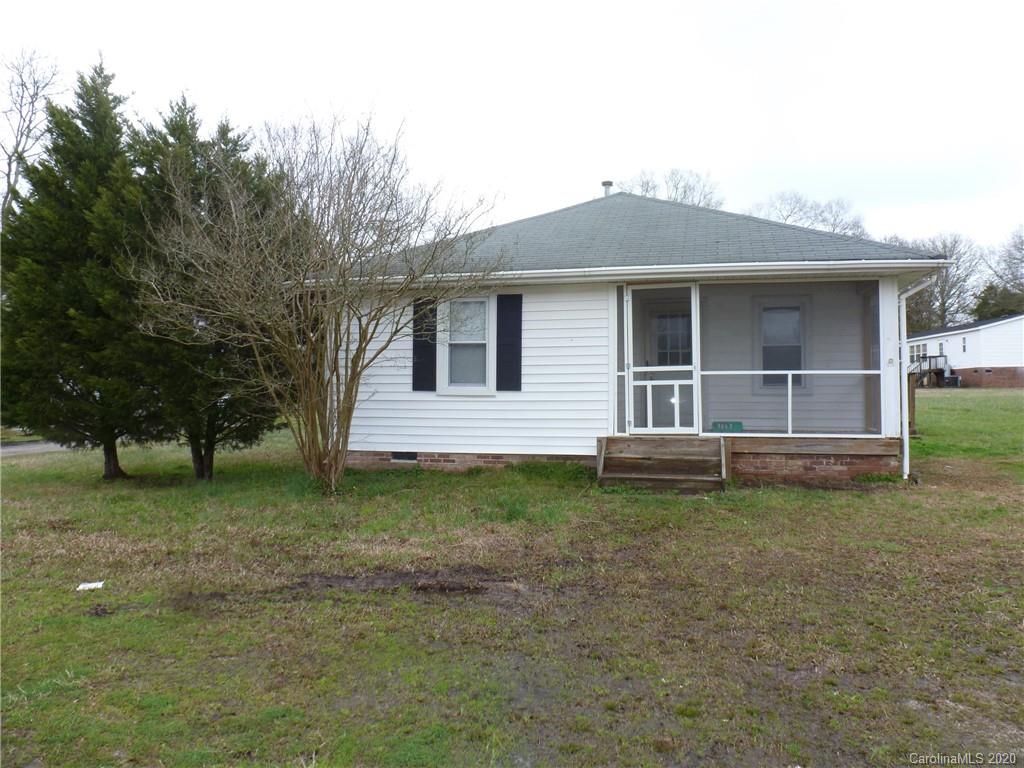 3643 Flat Creek Road Lancaster, SC 29720 - Photo 1 of 14 a backyard of a house with barbeque oven fire pit table and chairs
