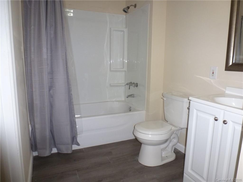 3643 Flat Creek Road Lancaster, SC 29720 - Photo 12 of 14 a bathroom with a toilet and a shower