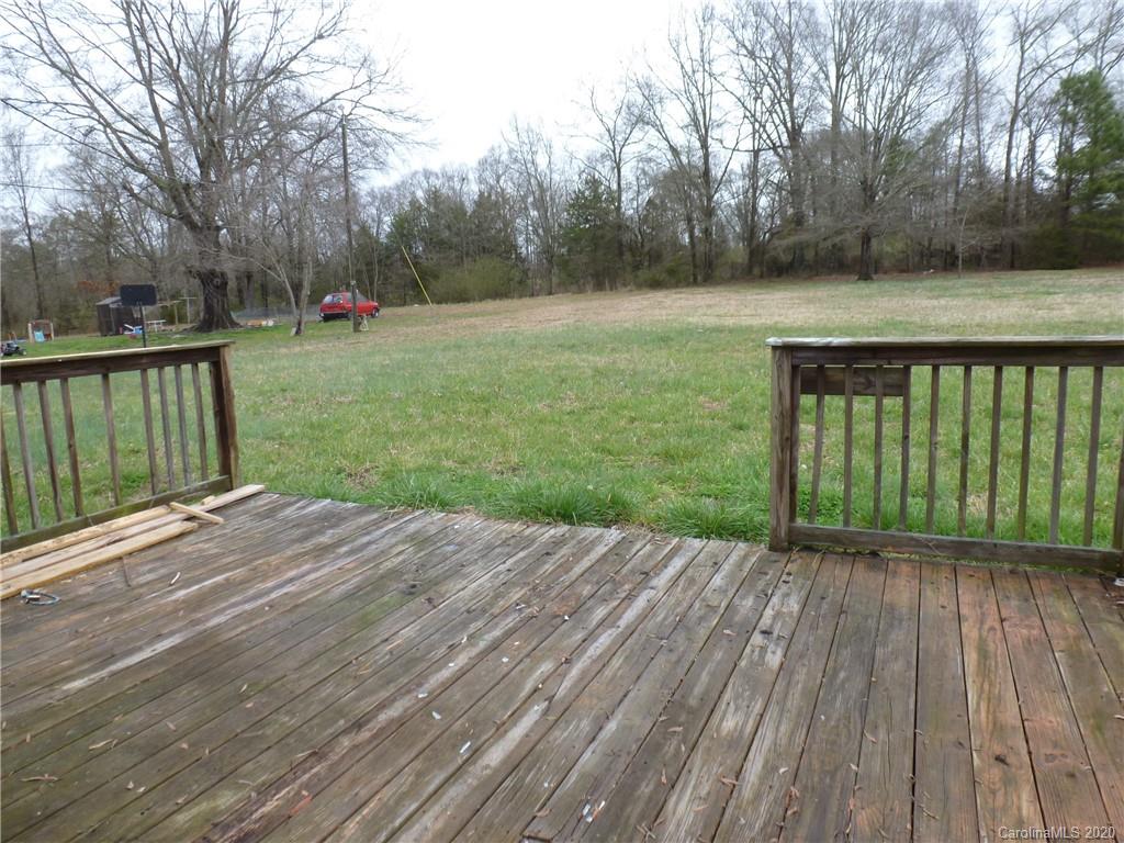 3643 Flat Creek Road Lancaster, SC 29720 - Photo 4 of 14 a view of a backyard with wooden floor