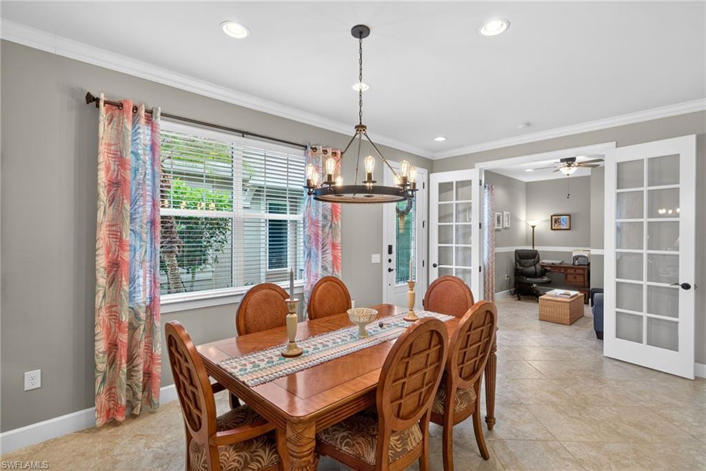 20105 Torch Key Way Estero, FL 33928 - Photo 9 of 29 a dining room with furniture and window