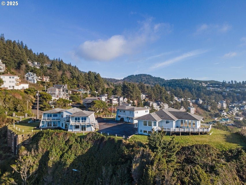 1816 Maxwell Mountain Road Oceanside, OR 97134 - Photo 4 of 18 a view of a town with big houses