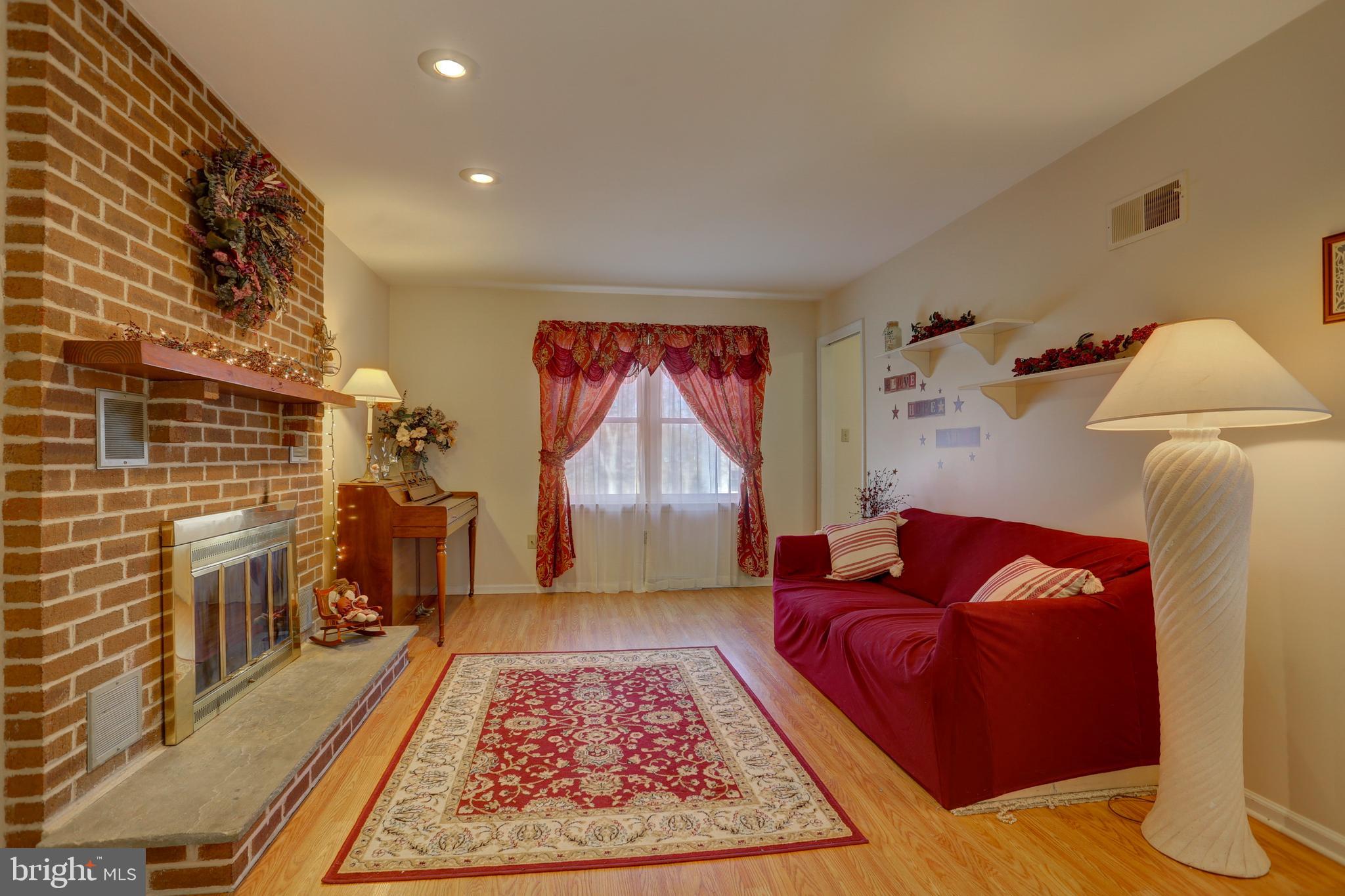 1820 Brubaker Run Road Lancaster, PA 17603 - Photo 12 of 42 First Floor Family Room Brick Fireplace