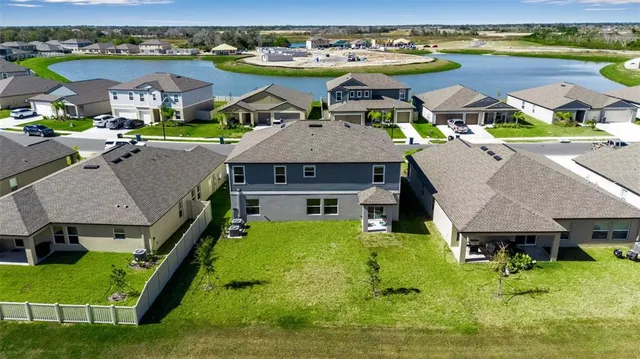 an aerial view of a house with a garden
