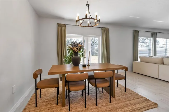 a bedroom with bed and a ceiling fan