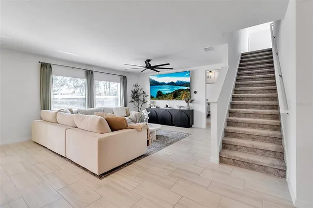 a bathroom with a double vanity sink a mirror and shower