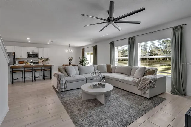 a view of walk in closet with clothes
