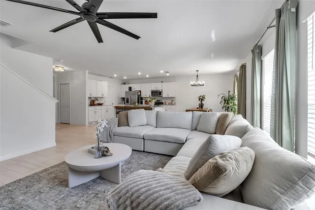 a bathroom with a sink vanity mirror and toilet