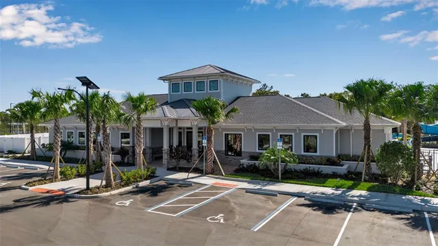 an aerial view of a house with a garden