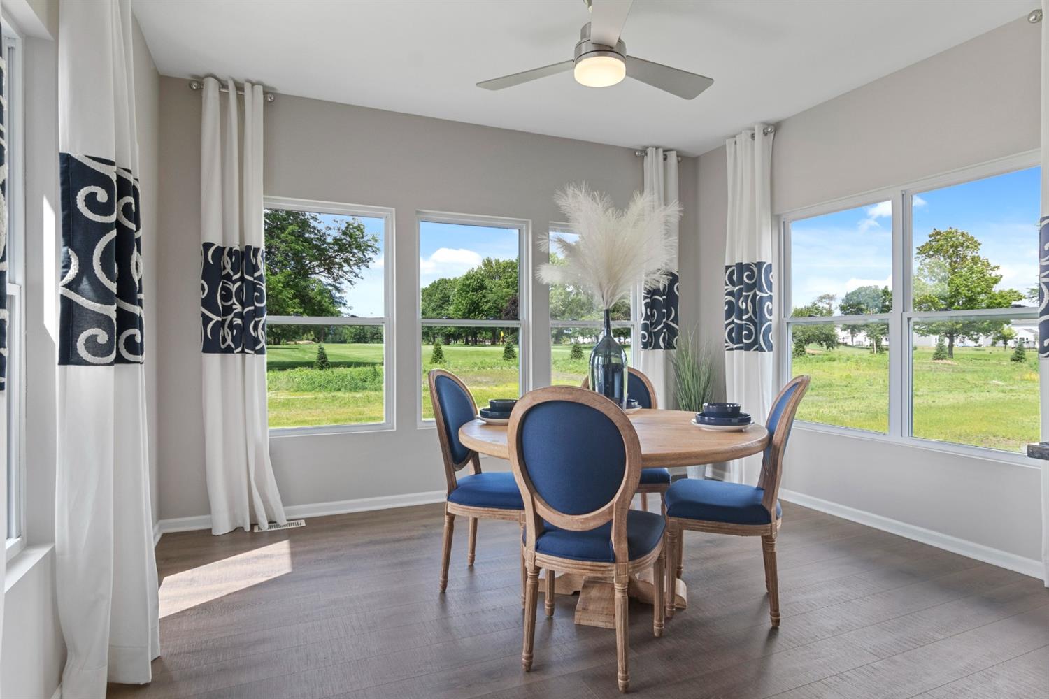 8686 Burr Rdg Circle Crown Point, IN 46307 - Photo 12 of 24 a dining room with furniture water view and garden view