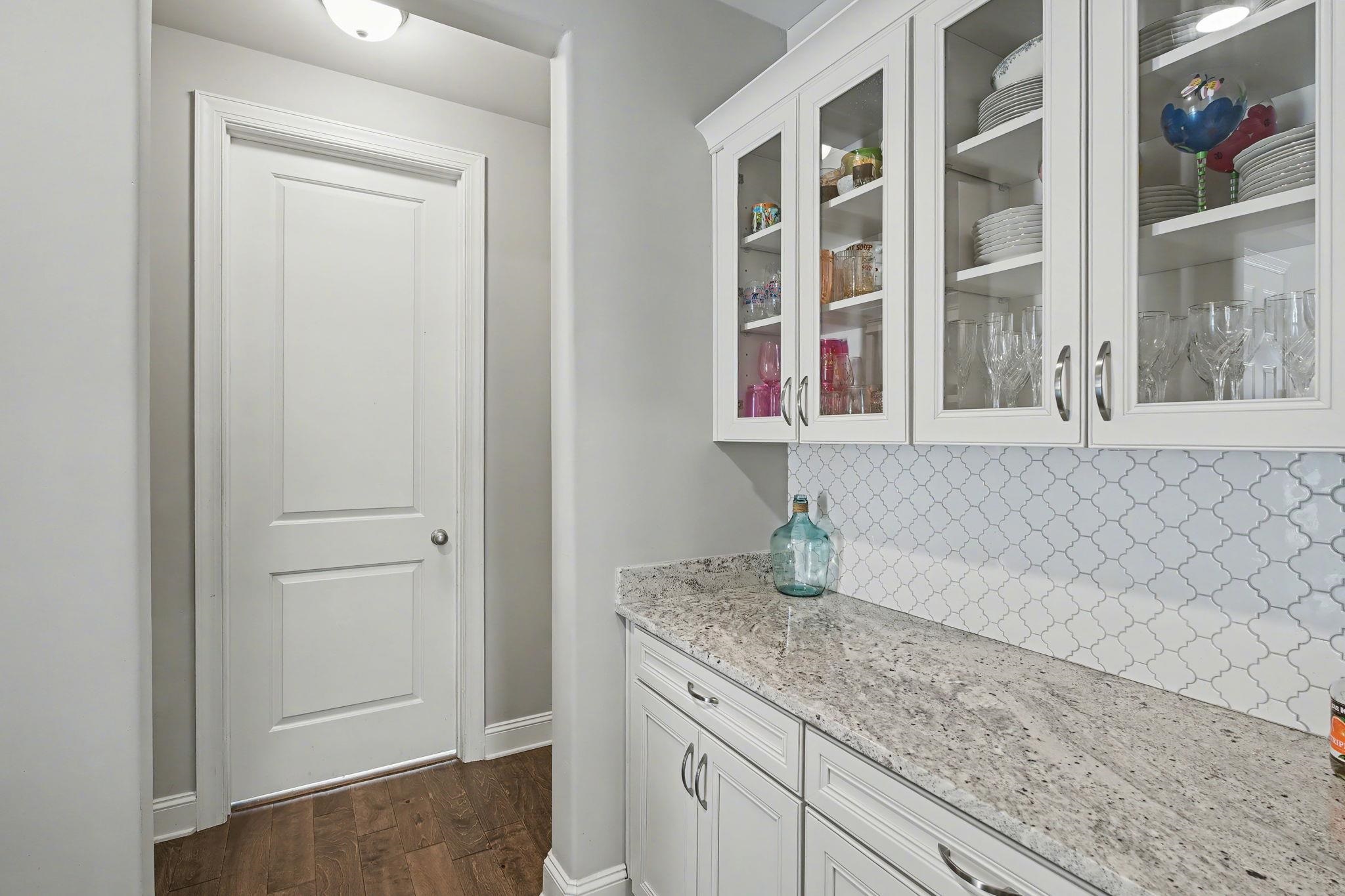 477 Fallen Timbers Cove Collierville, TN 38017 - Photo 21 of 40 a bathroom with a granite countertop sink and mirror