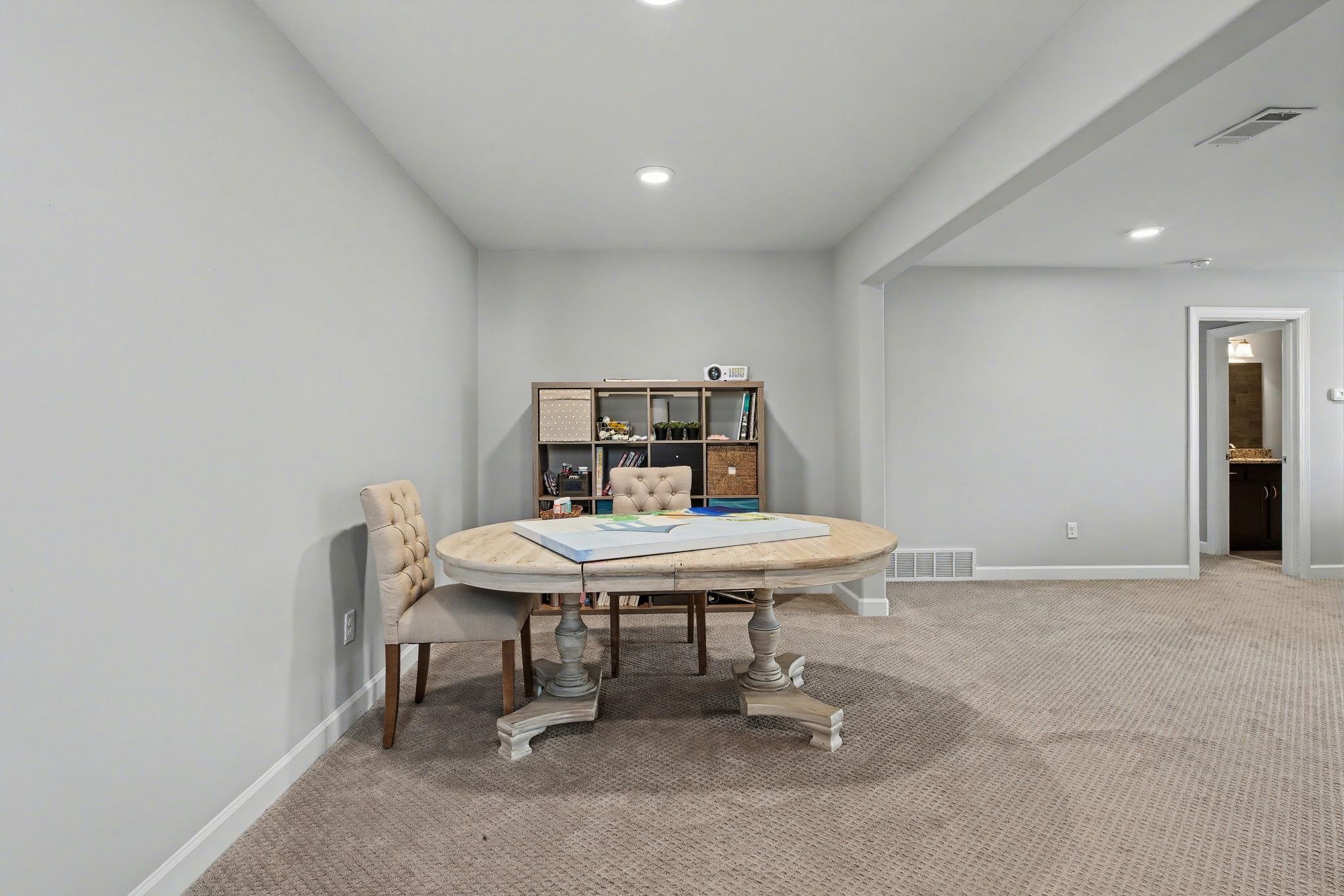477 Fallen Timbers Cove Collierville, TN 38017 - Photo 26 of 40 a view of a room with a table and chairs