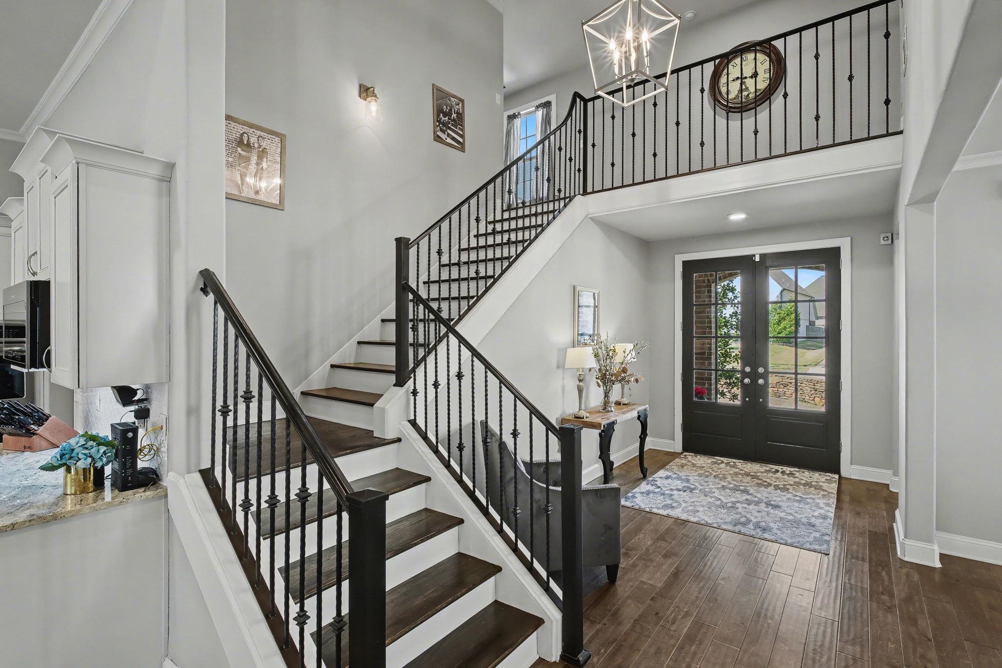 477 Fallen Timbers Cove Collierville, TN 38017 - Photo 6 of 40 a view of an entryway wooden floor