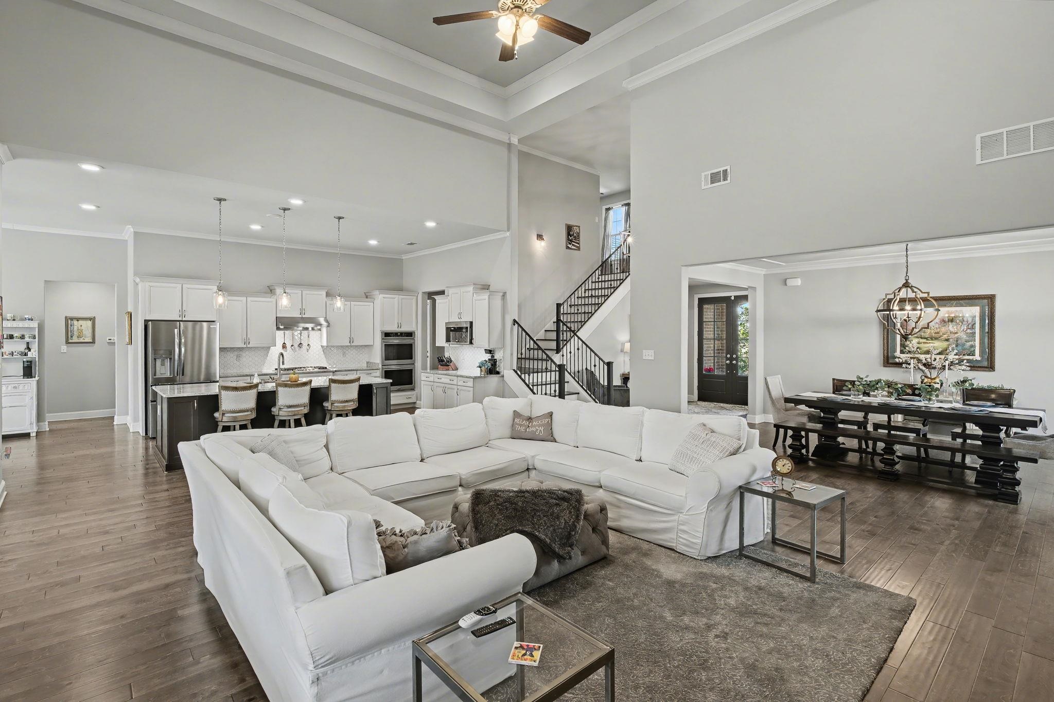 477 Fallen Timbers Cove Collierville, TN 38017 - Photo 9 of 40 a living room with furniture and wooden floor