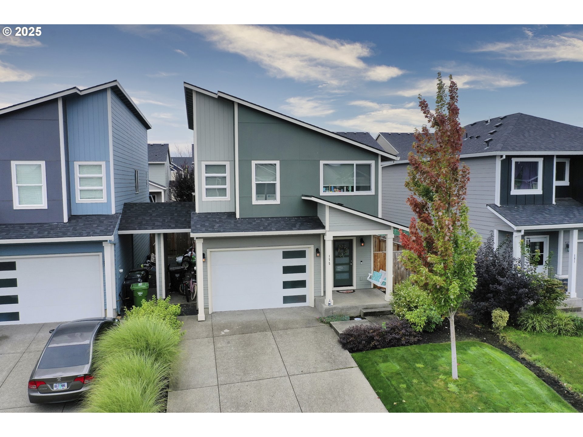 175 Kindre Street St. Helens, OR 97051 - Photo 3 of 22 a front view of a house with garden