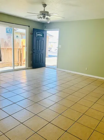 a bathroom with a toilet a sink a shower and mirror
