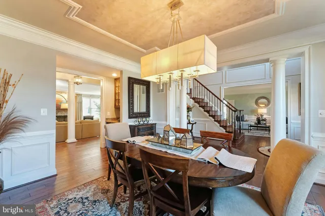 a kitchen with stainless steel appliances kitchen island granite countertop a sink stove and cabinets
