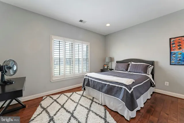 a patio with a table and chairs
