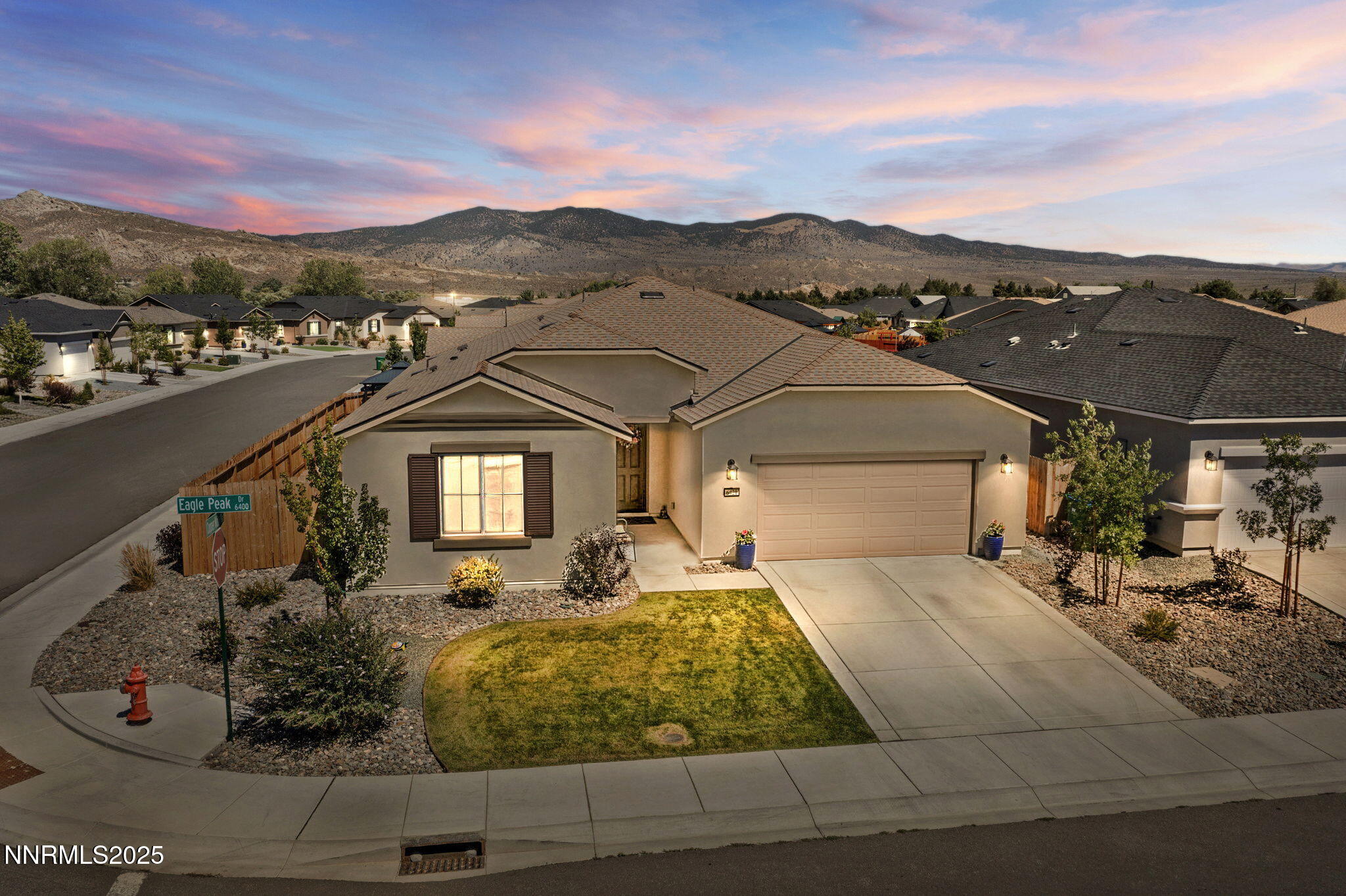 6421 Eagle Peak Drive Carson City, NV 89701 - Photo 1 of 38 a front view of a house with a yard