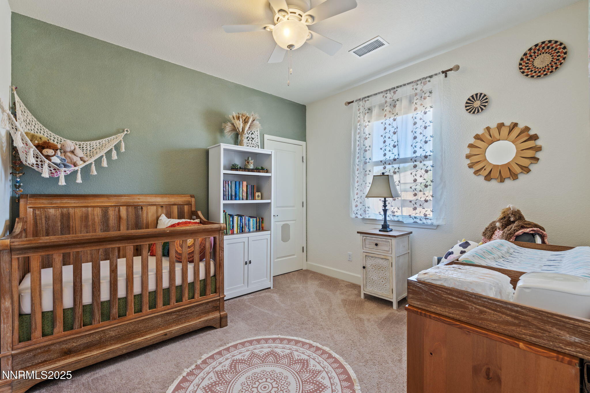 6421 Eagle Peak Drive Carson City, NV 89701 - Photo 24 of 38 a bedroom with furniture and window