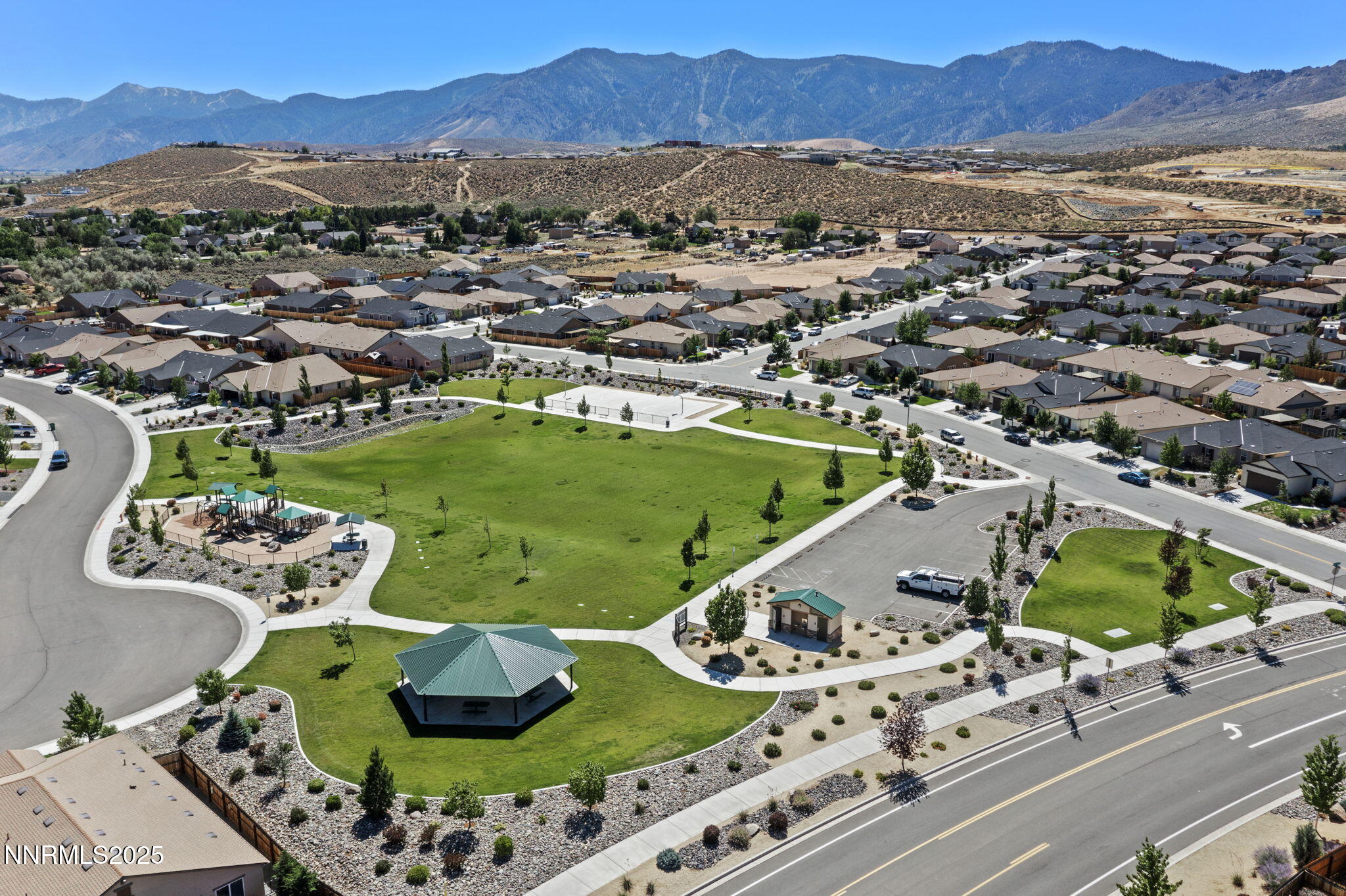6421 Eagle Peak Drive Carson City, NV 89701 - Photo 37 of 38 an aerial view of a house with garden space and mountain view in back