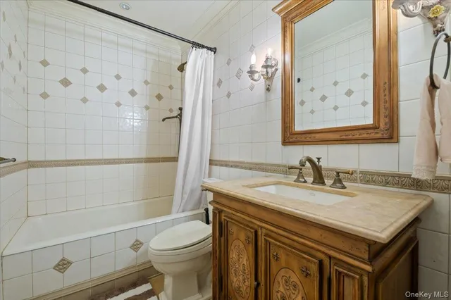 a kitchen with granite countertop a stove top oven sink and cabinets