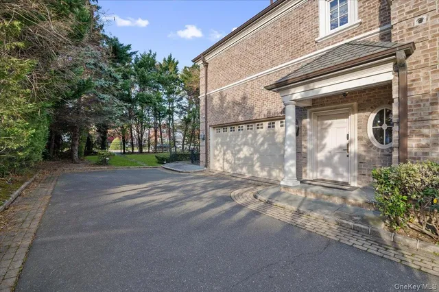 a view of a house with a street