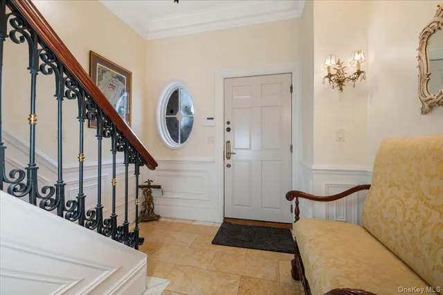 a view of an entryway with staircase