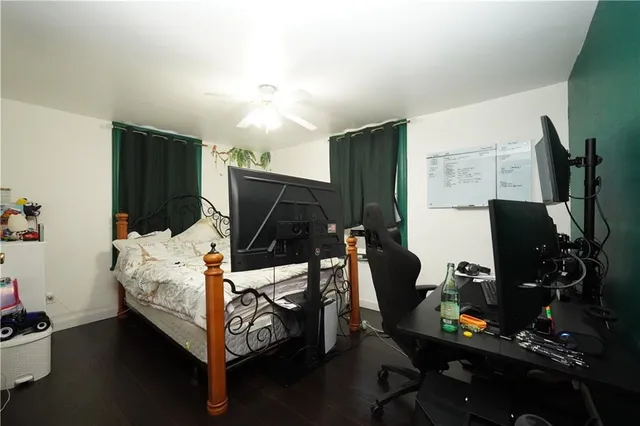 a bedroom with furniture and a window