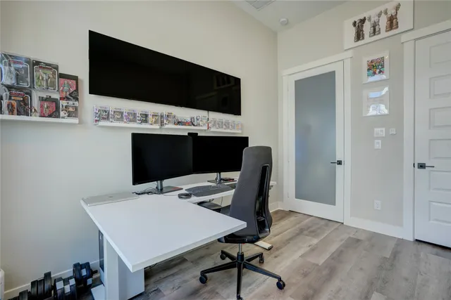 a view of a workspace with furniture