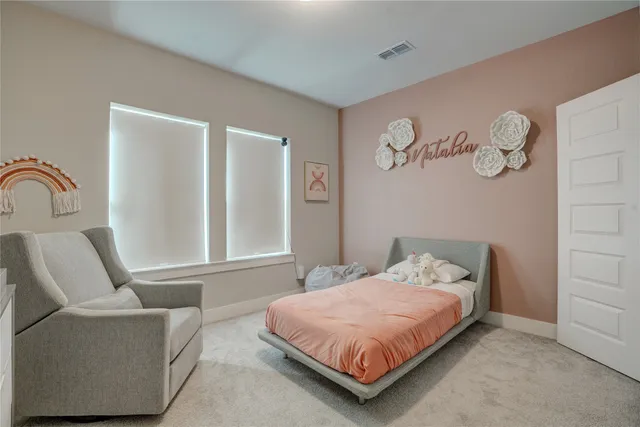 a bedroom with a bed and closet