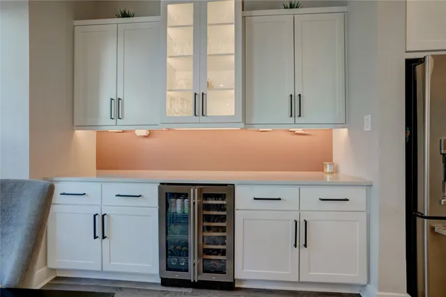 a room with cabinet and a window