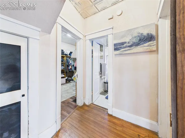 a view of a bedroom from a hallway