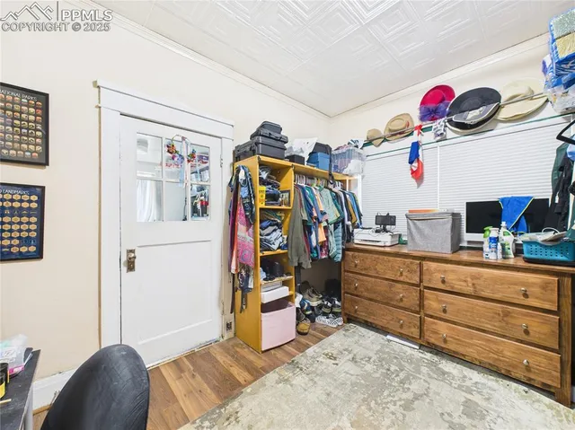 a bed room with a bed and a window