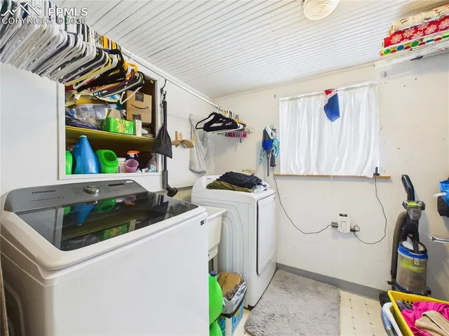 a utility room with dryer and washer