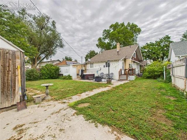 a house view with a garden space