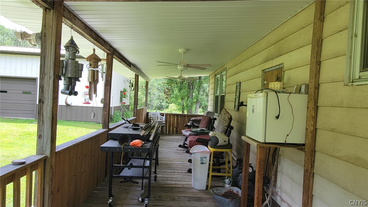 4524 Maybury Road Solon, NY 13101 - Photo 28 of 42 Covered back deck