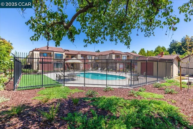 a view of a yard with a garden