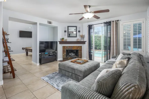 a bathroom with a sink mirror vanity and toilet