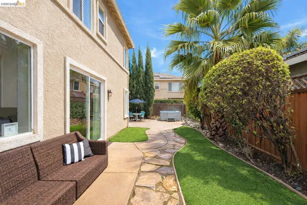 a view of swimming pool with a patio