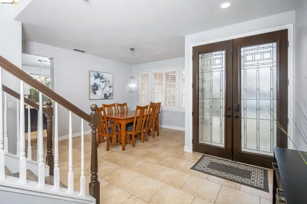 a view of a livingroom with furniture and windows