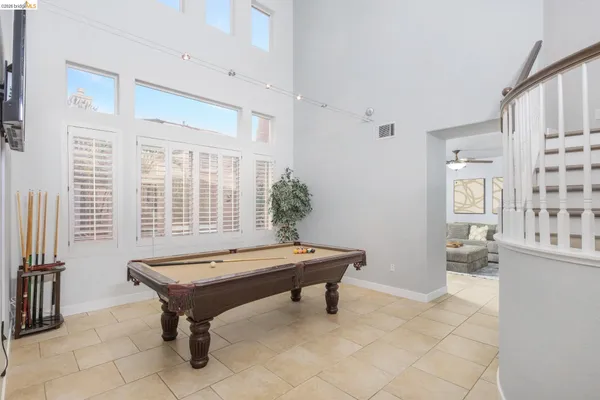 a view of entryway and hall with a front door