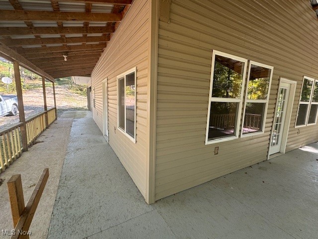 44591 Smith Road Lewisville, OH 43754 - Photo 3 of 13 View of home's exterior with a patio area