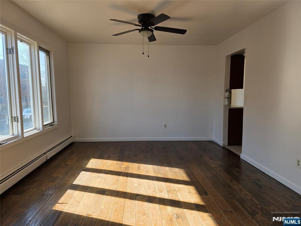 320-322 Williams, Unit 322 Hasbrouck Heights, NJ 07604 - Photo 3 of 12 a view of an empty room with a window