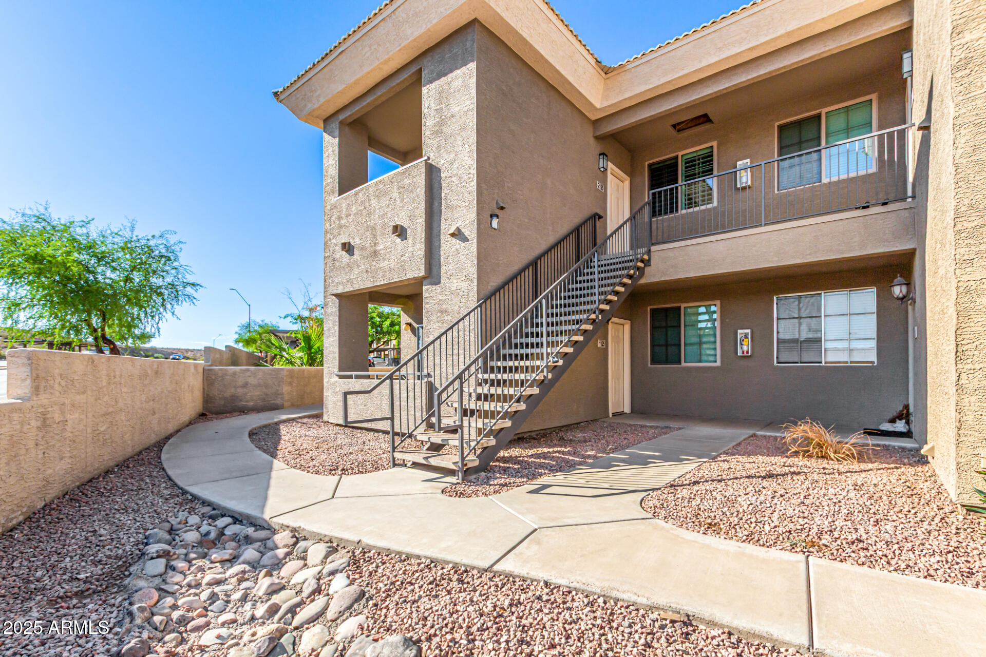 1720 East Thunderbird Road, Unit 2125 Phoenix, AZ 85022 - Photo 1 of 37 a front view of a house with a yard