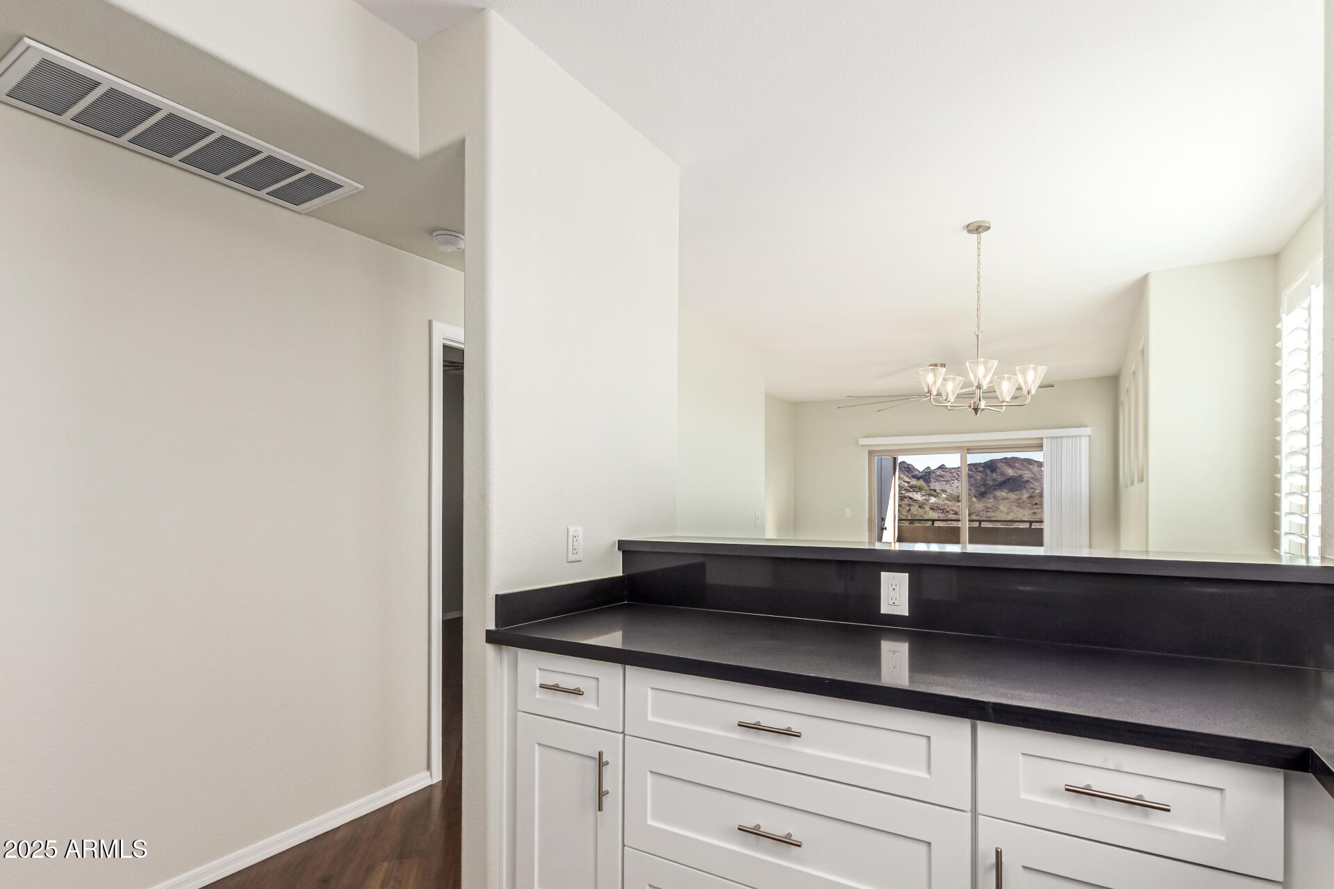 1720 East Thunderbird Road, Unit 2125 Phoenix, AZ 85022 - Photo 12 of 37 a kitchen with a sink and a window