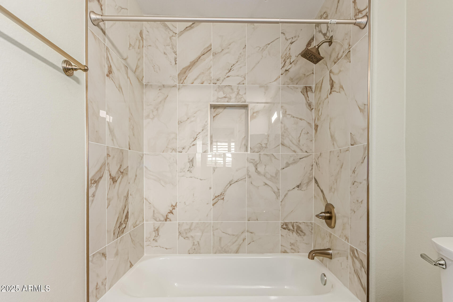 1720 East Thunderbird Road, Unit 2125 Phoenix, AZ 85022 - Photo 20 of 37 a bathroom with a shower and a shower curtain