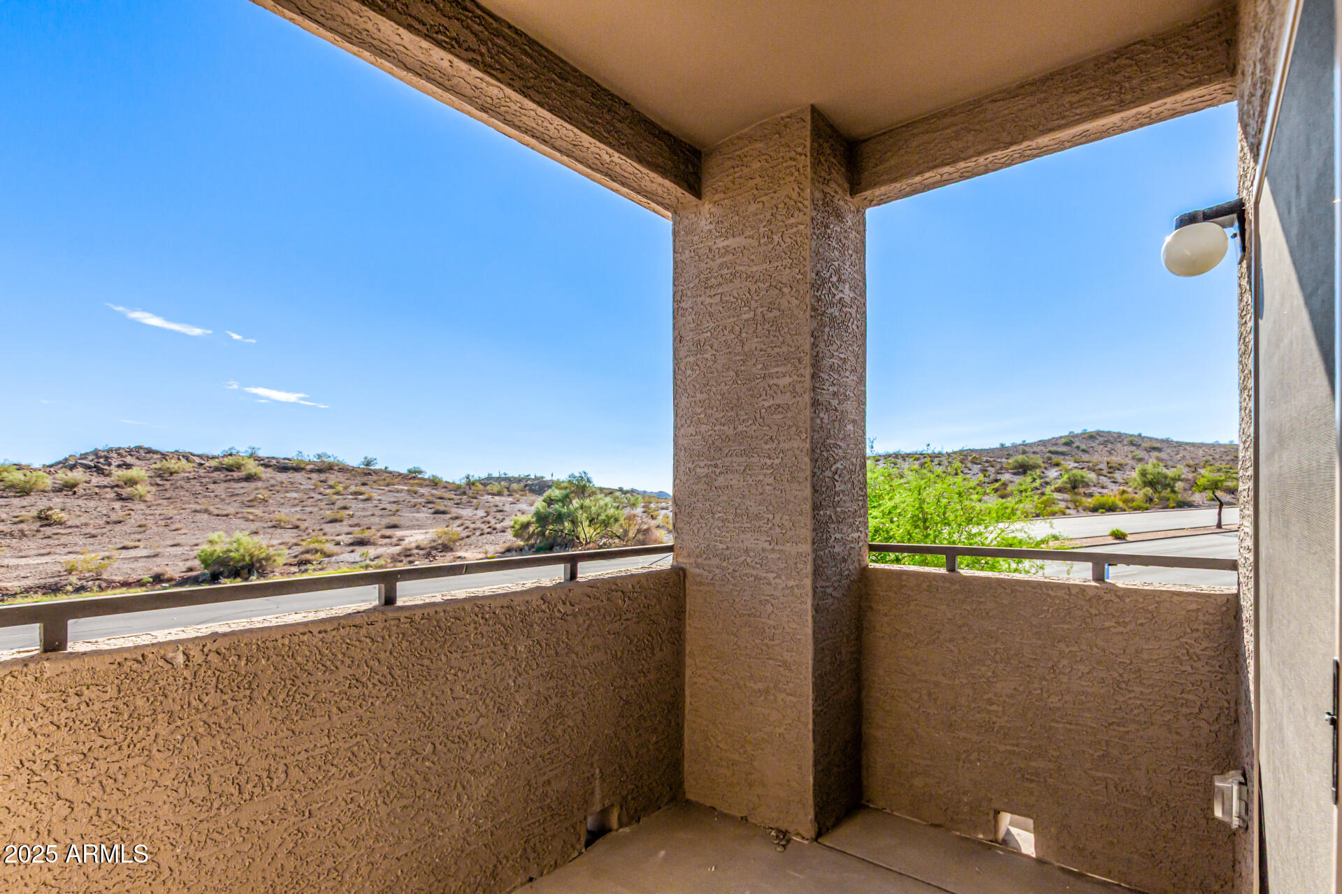 1720 East Thunderbird Road, Unit 2125 Phoenix, AZ 85022 - Photo 22 of 37 a view of a balcony with an ocean view